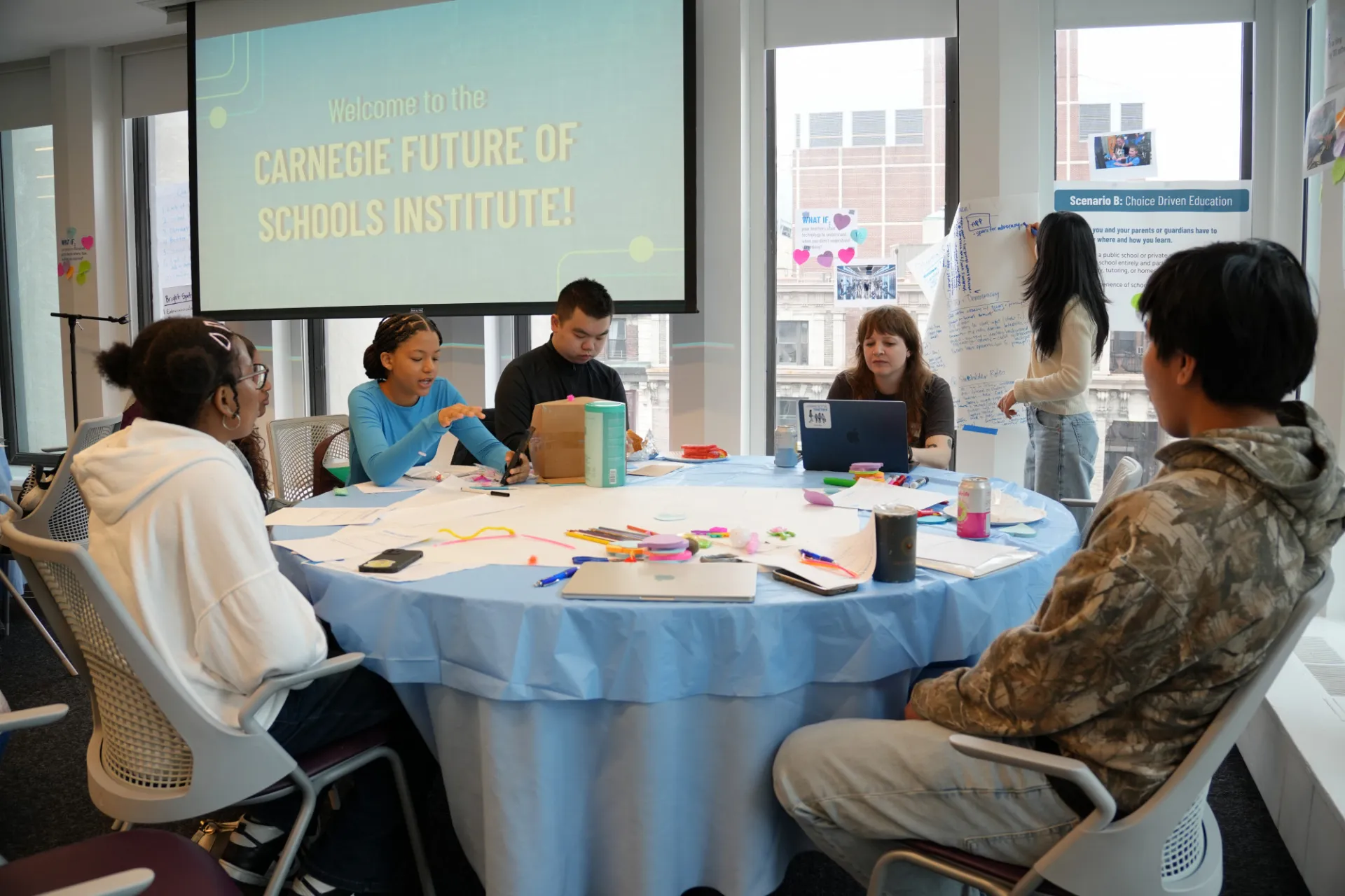 Students working on their models for their vision of school. 