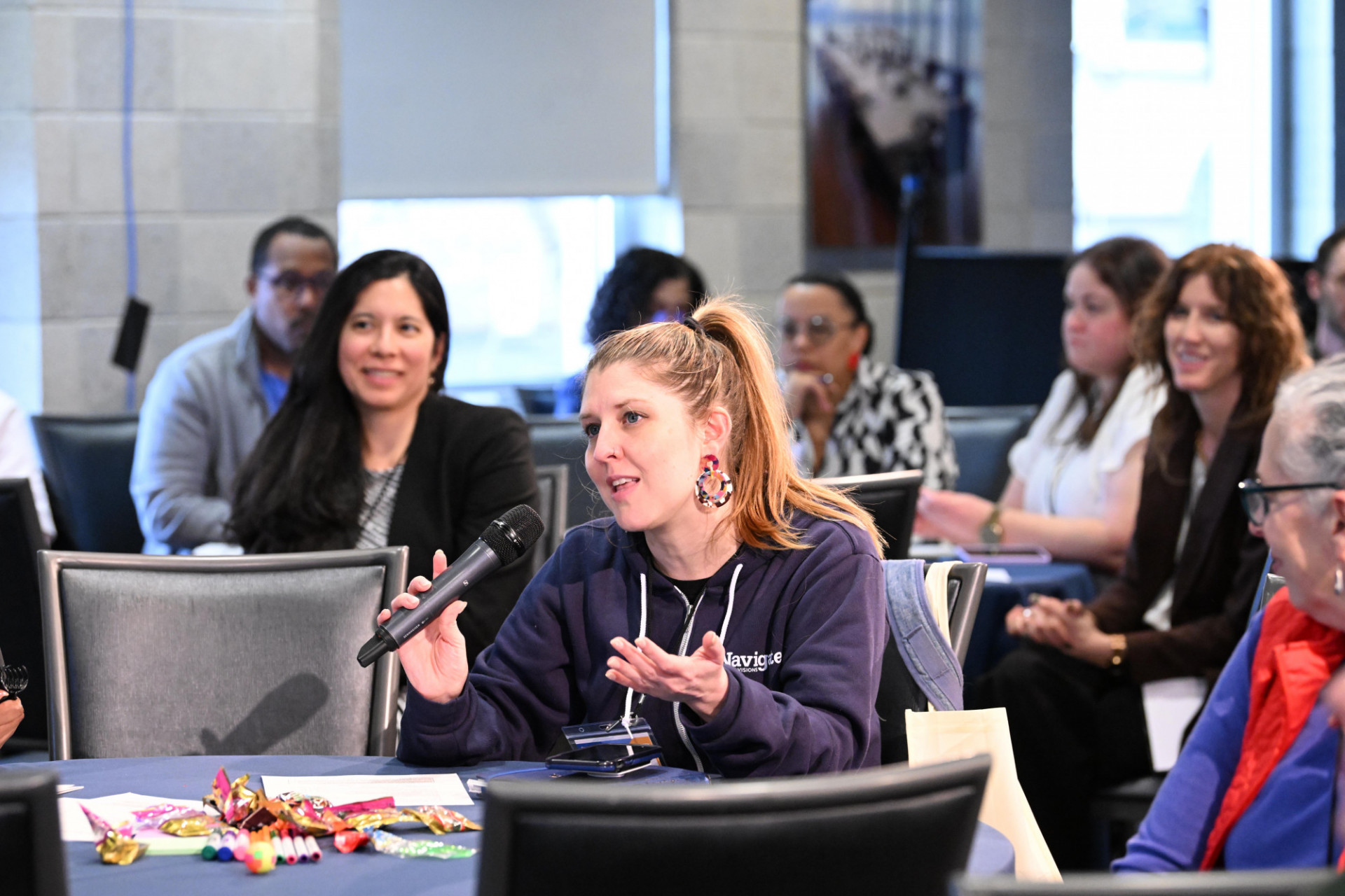 a person speaking into a microphone